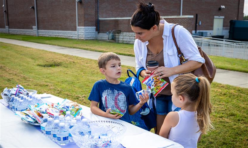 Students enjoy pastries with their parents